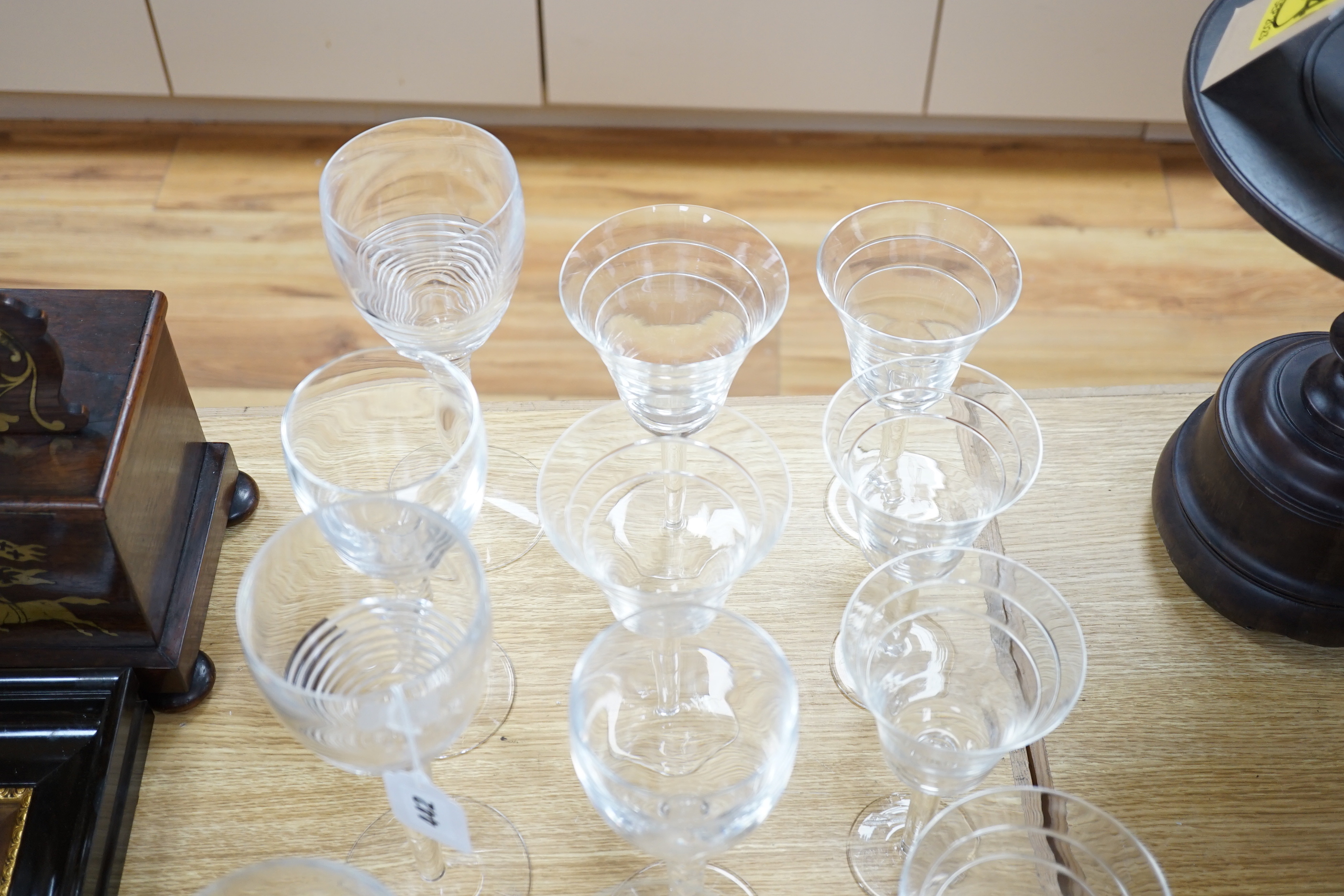 A group of mixed Jasper Conran, Stuart and Tiffany wine and champagne glasses, tallest 25cm high (13)